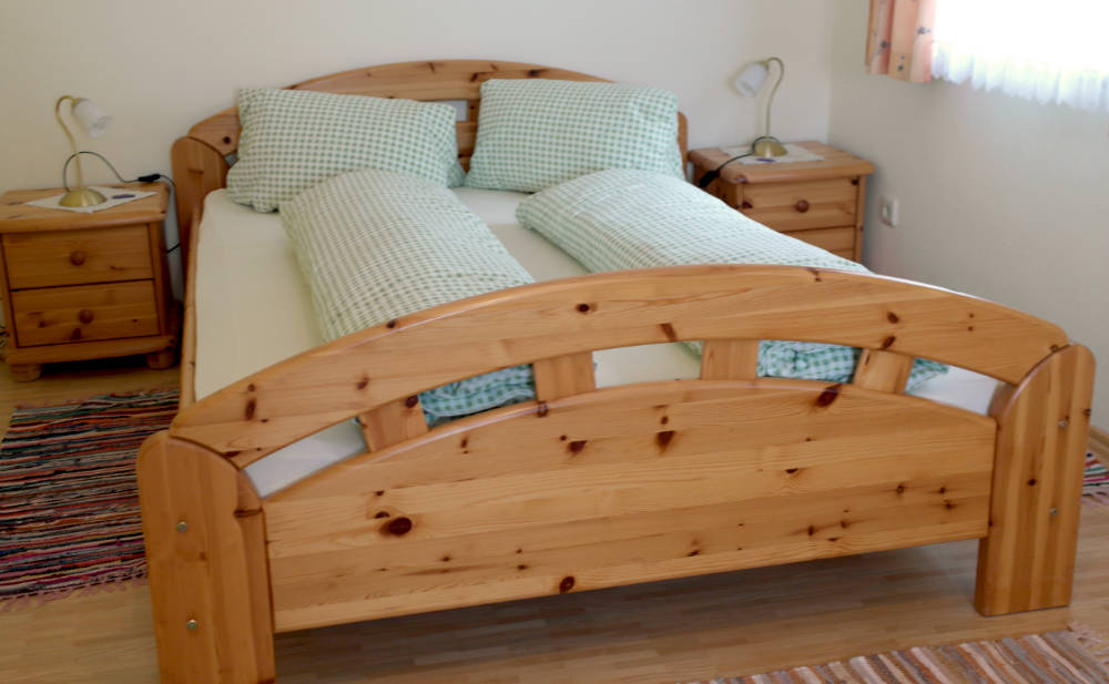 landhauswohnung-bett