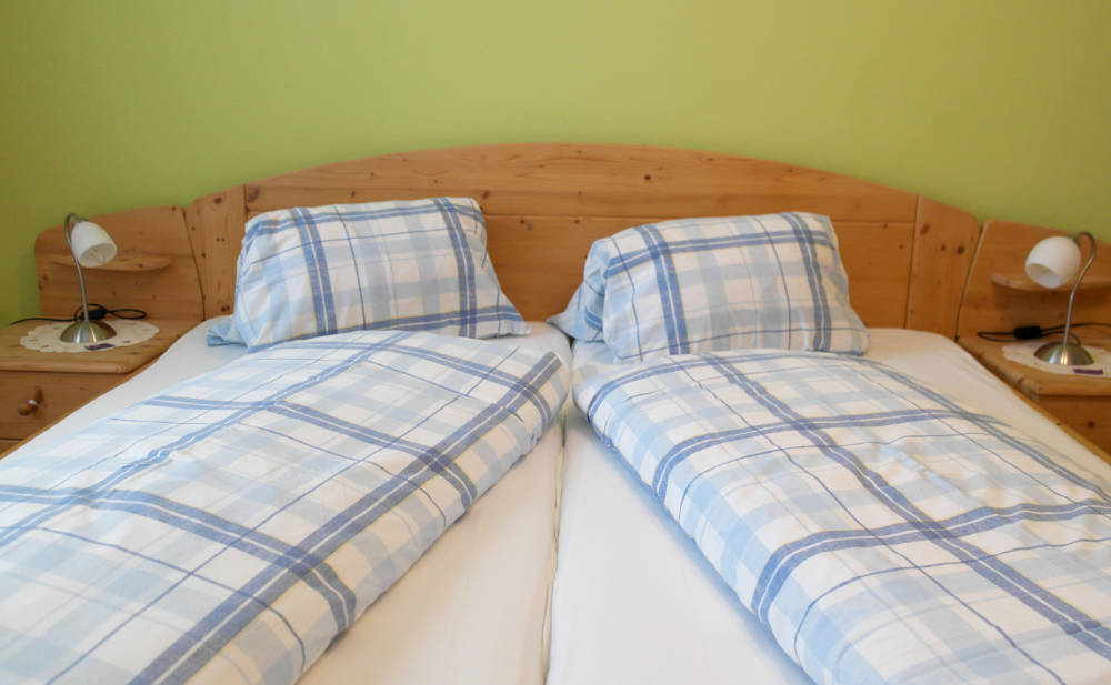landhauswohnung-bett